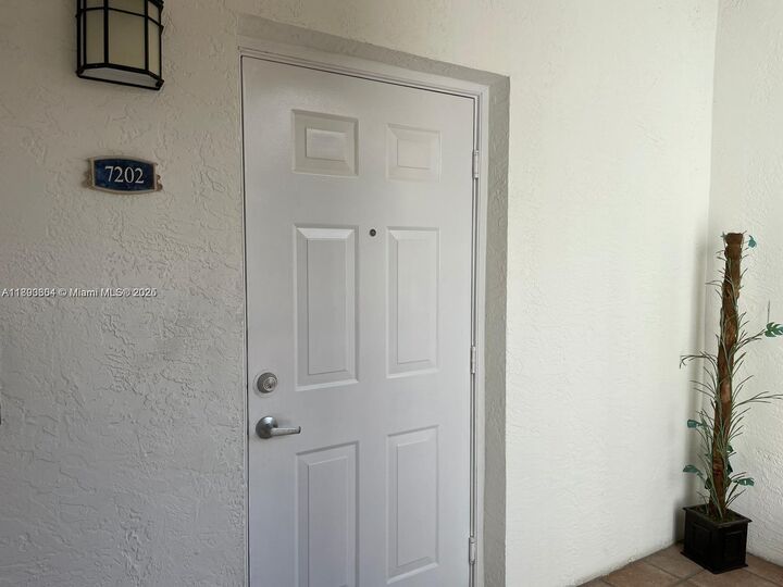Property Photo:  3105 NE 184th St 7202  FL 33160 
