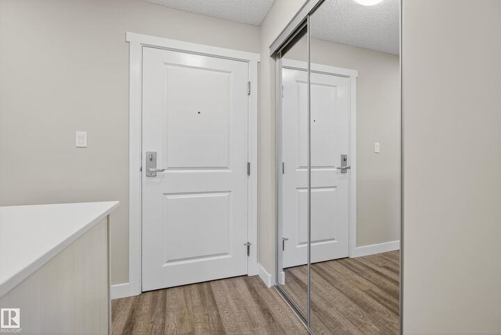 Property Photo: 1506 Tamarack Boulevard NW 316 AB T6T 2J5