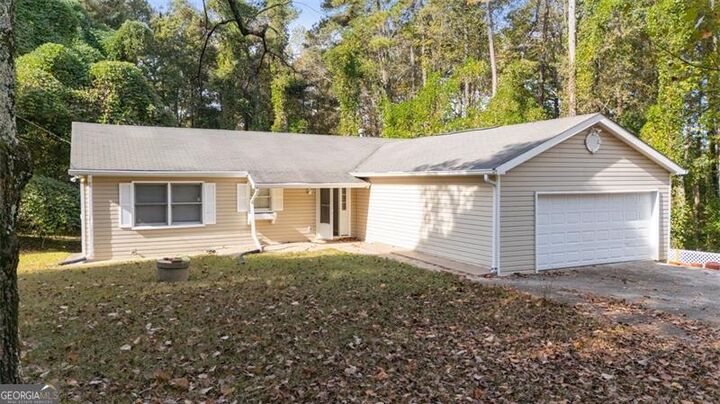 Property Photo:  667 Alcovy Forest Drive  GA 30045