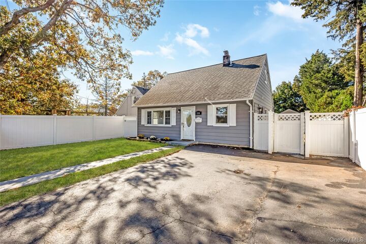 Property Photo:  104 Carlls Path  NY 11703 