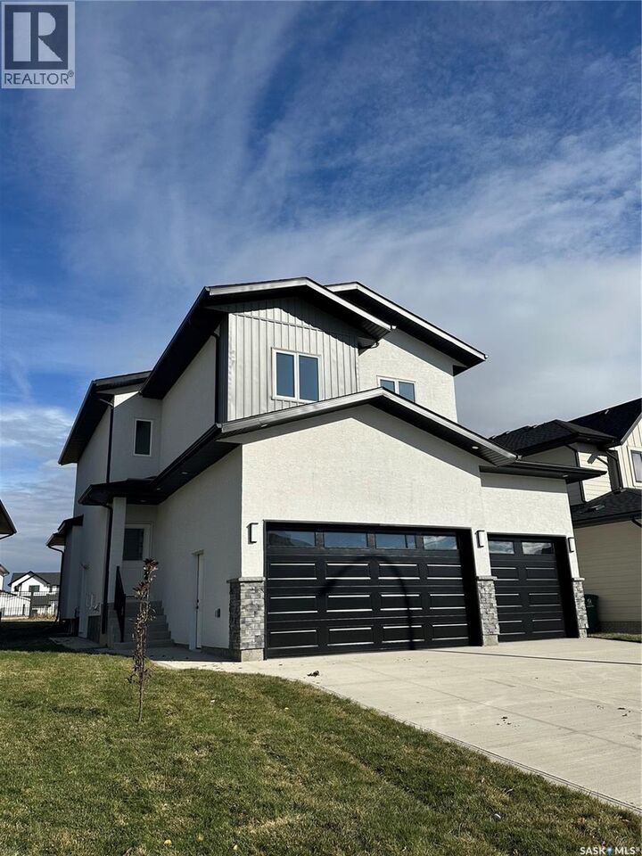 Property Photo:  147 Woolf Bend  SK S7W 0L6