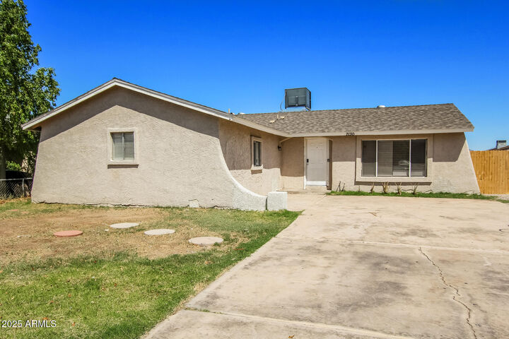 Property Photo:  7130 W Merrell Street  AZ 85033