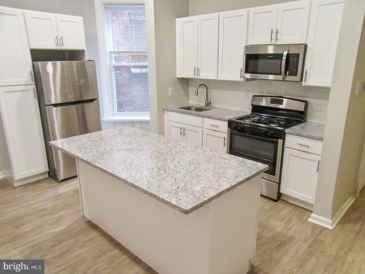 Property Photo:  1726 Memorial Avenue  PA 19104 