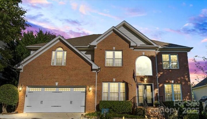 Property Photo:  11809 Farnborough Road  NC 28078 