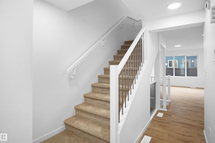 Property Photo: 1430 Aster Way NW 26 AB T6T 2N8