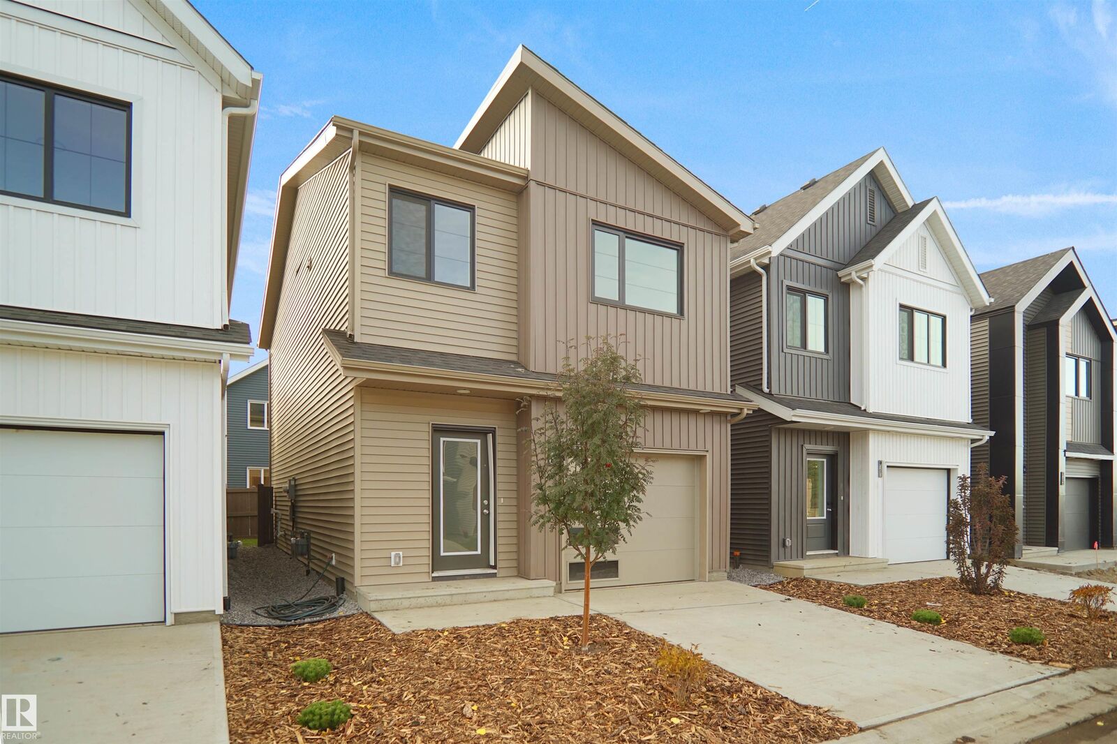 Property Photo: 1430 Aster Way NW 24 AB T6T 2N8