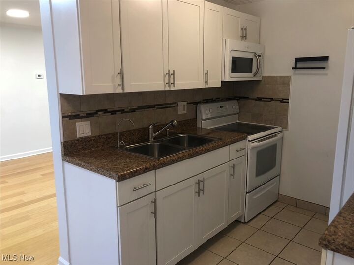 Property Photo:  1402 Golden Gate Boulevard  OH 44124