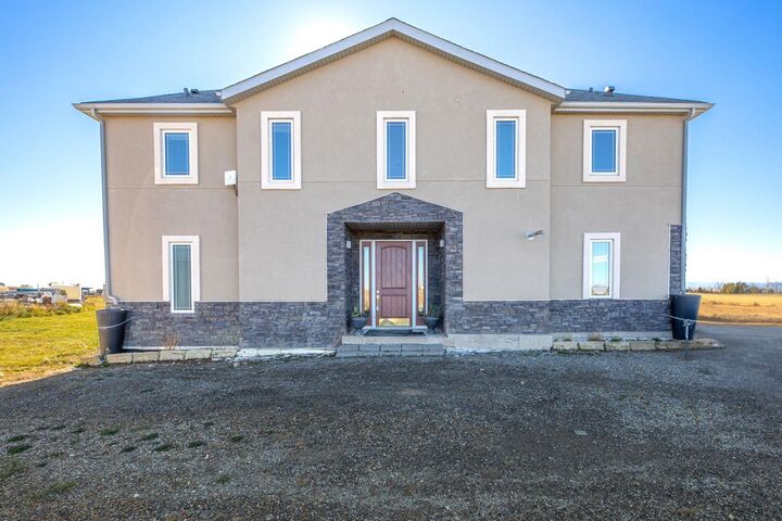 Property Photo: 434072 Clear Mountain Drive E AB T1S 1A1