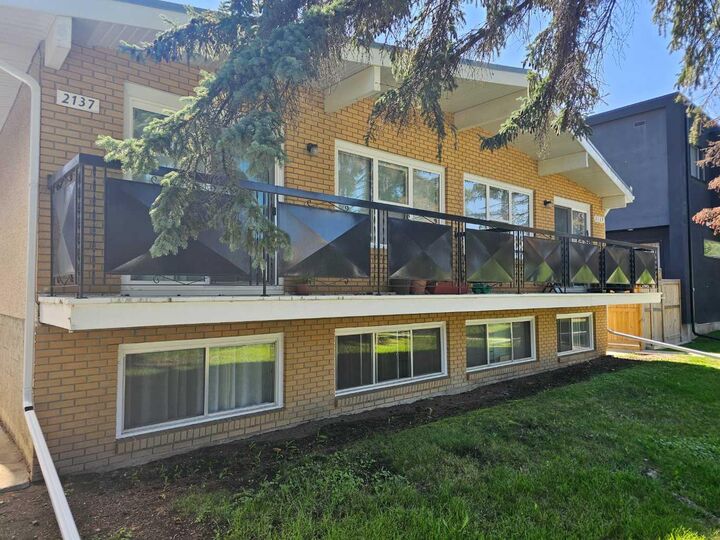 Property Photo:  2137 / 2139 53 Avenue SW  AB T3E 1K9
