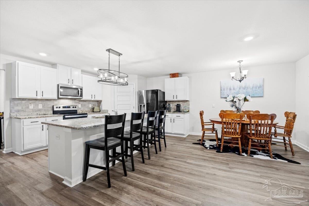 Property Photo: 5150 Gaineswood Dr FL 32583