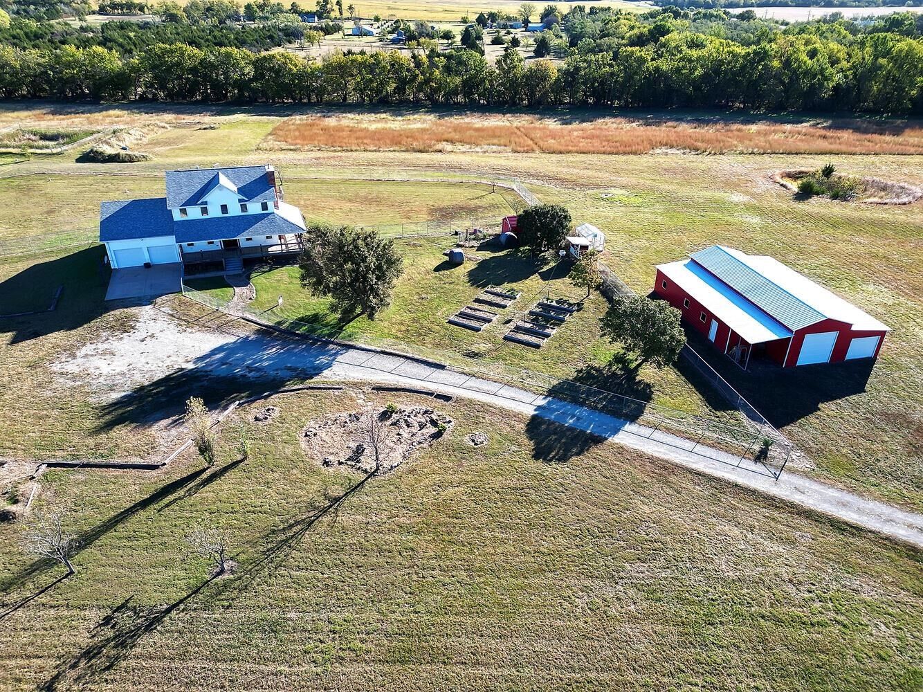 Property Photo:  664 E 90th Ave N  KS 67013 