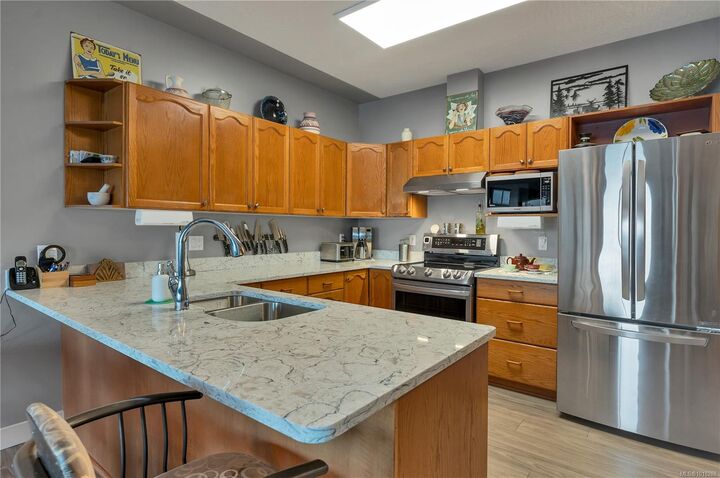 Property Photo: 1350 Island Hwy S 304 BC V9W 1B7