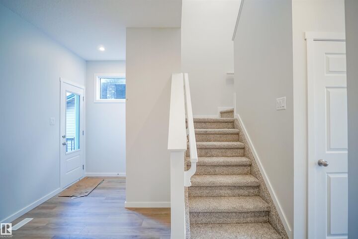 Property Photo:  101 Ficus Way  AB T8L 0Z6 