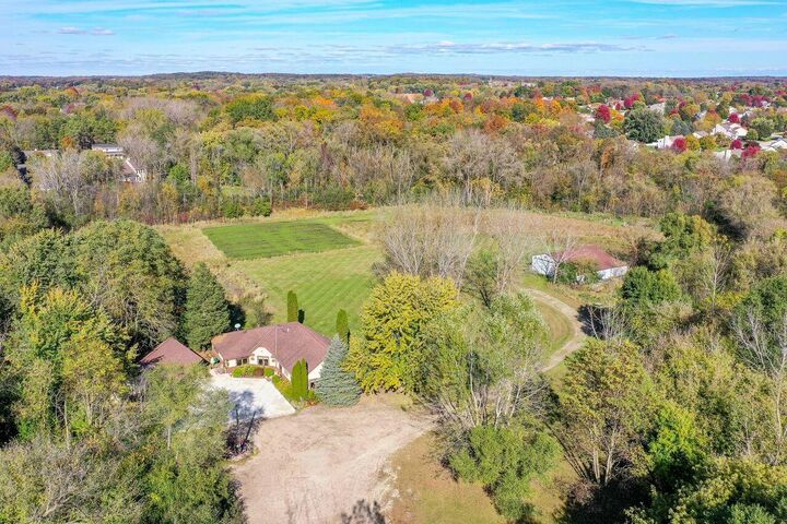 Property Photo:  W179s8246 Pioneer Dr  WI 53150