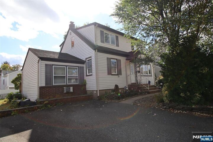 Property Photo:  28-12 Sherman Place  NJ 07410