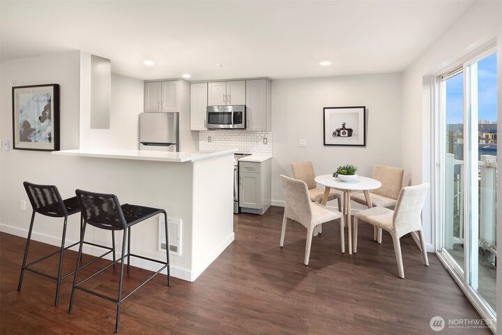 Property Photo:  3318  30th Avenue SW A502  WA 98126