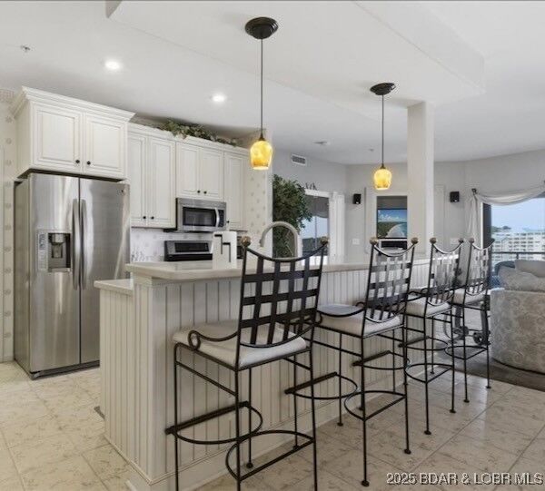 Property Photo:  12 Monarch Cove Court 5B  MO 65049 