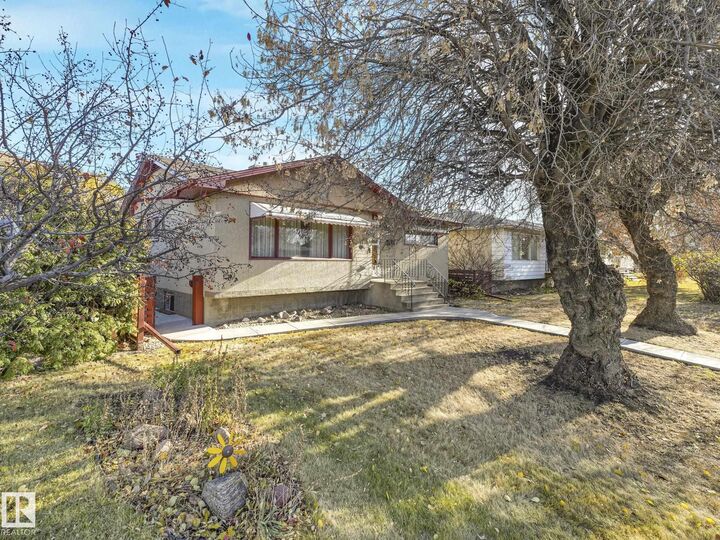 Property Photo: 12233 54 Street NW AB T5W 3N6