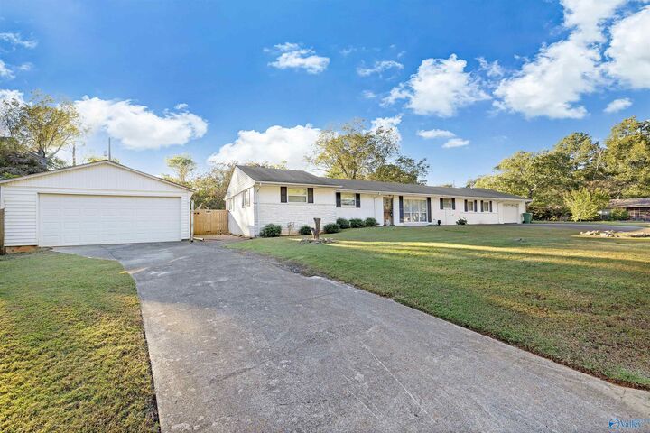 Property Photo:  307 Harolds Drive NW  AL 35806