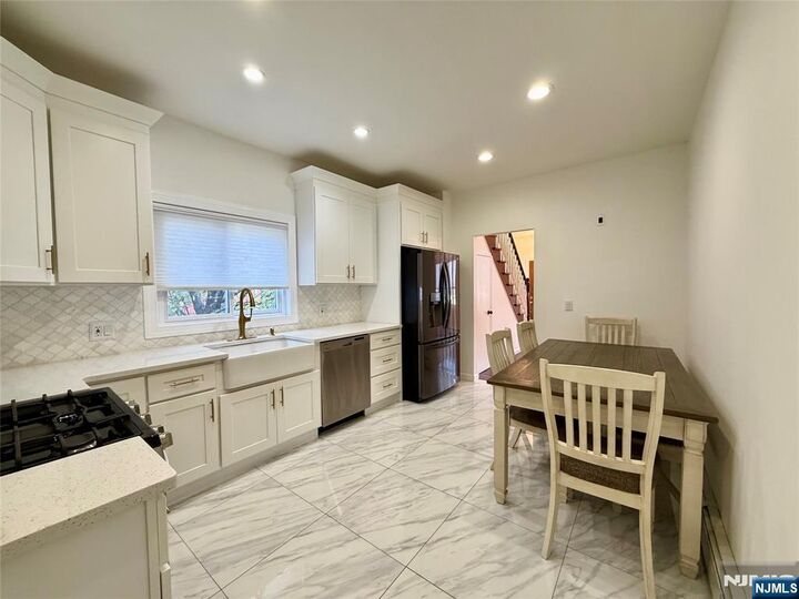 Property Photo:  8 Avenue B  NJ 07508 