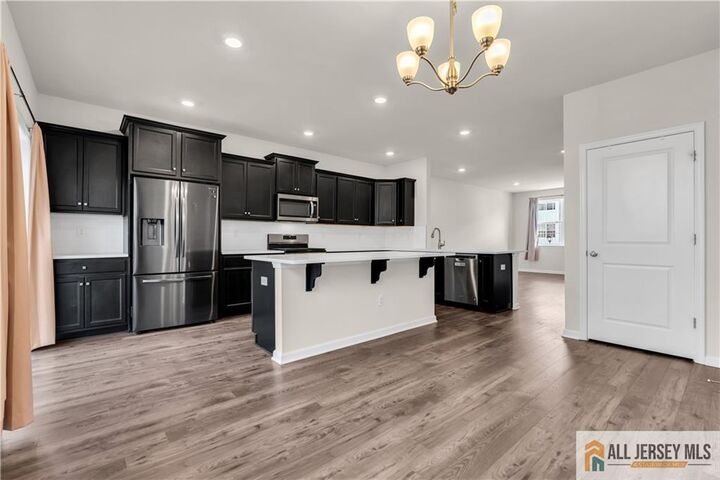 Property Photo:  504 E International Road 504  NJ 08831 