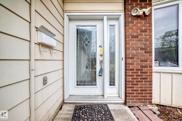 Property Photo:  9220 172 Street NW  AB T5T 3G2 