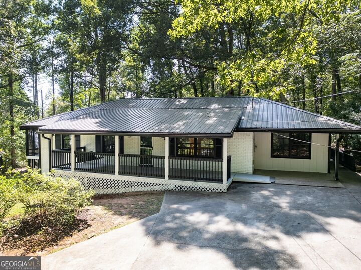 Property Photo:  3058 White Road NE  GA 30012