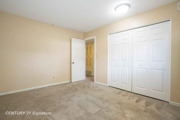 Property Photo:  105 Provincial Court Ct 3  MI 48638