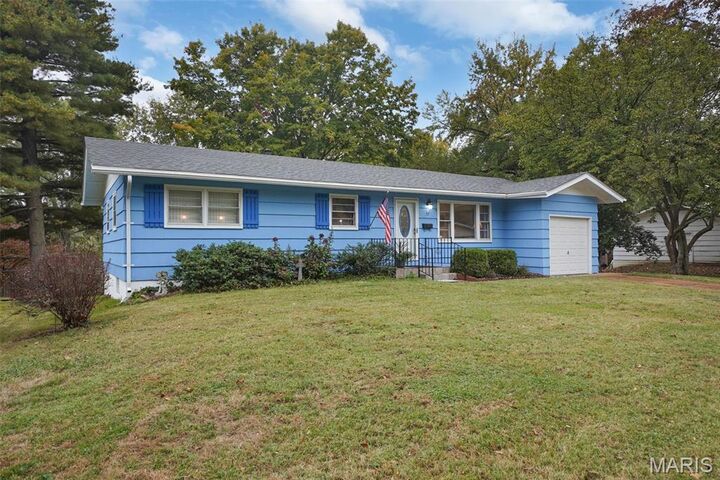 Property Photo:  57 Forestwood Drive  MO 63135 