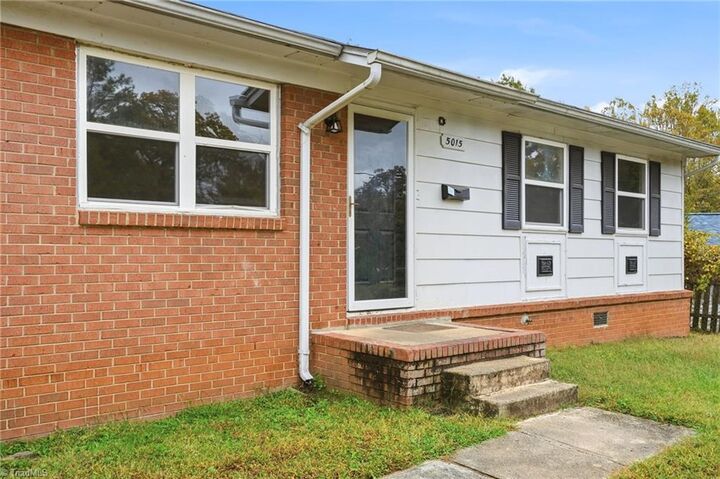 Property Photo: 5015 Farmoor Circle NC 27105