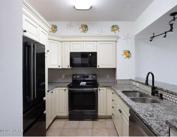 Property Photo: 9900 S Thomas Drive 2114 FL 32408