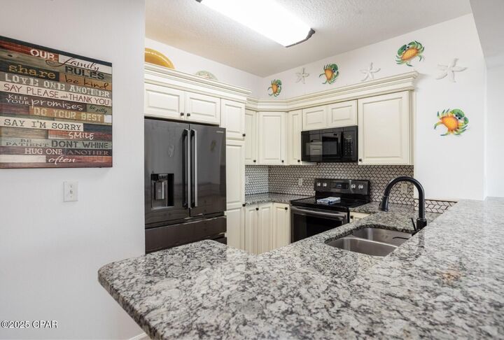 Property Photo: 9900 S Thomas Drive 2114 FL 32408