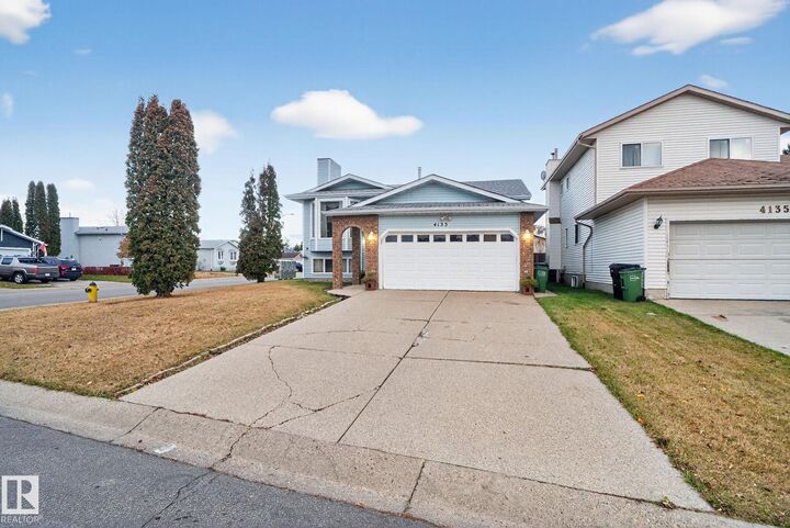 Property Photo: 4133 28 Avenue NW AB T6L 4H2