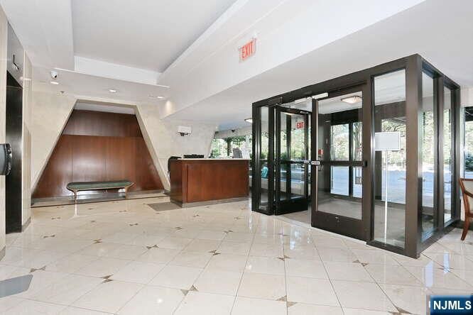 Property Photo:  2 Horizon Road 404  NJ 07024 