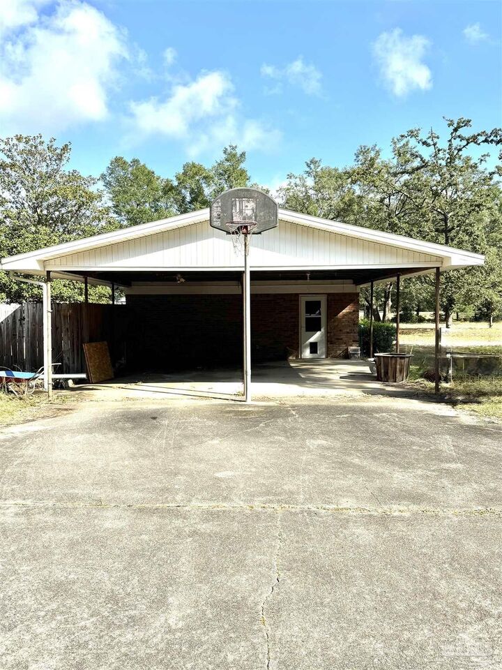 Property Photo:  5636 Camellia Ave  FL 32570 