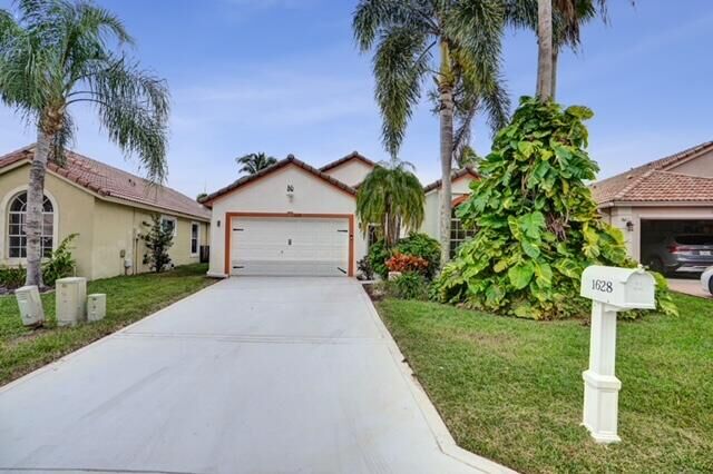 Property Photo: 1628 Carriage Brooke Drive FL 33414