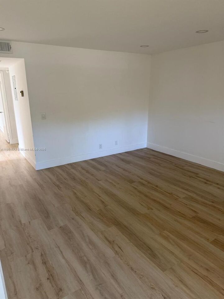 Property Photo:  100 SW 132nd Way 205K  FL 33027 