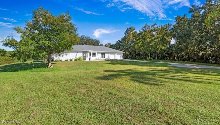 Property Photo:  410 11th Street NW  FL 34120 