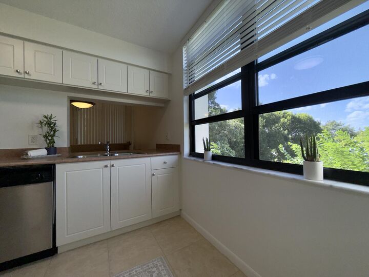 Property Photo:  2025 Lavers Circle D411  FL 33444 