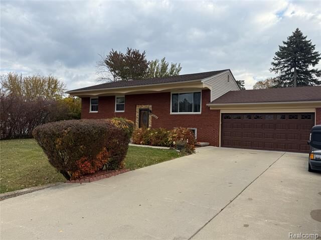 Property Photo: 1442 Sunset Drive MI 48390