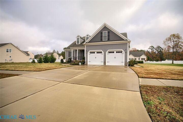 Property Photo:  5941 Roland Smith Drive  VA 23061 