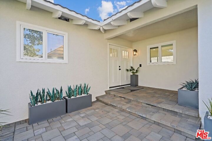 Property Photo:  11001 Garden Grove Ave  CA 91326 