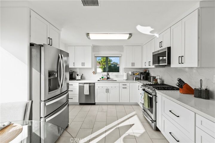 Property Photo:  8572 Arnett  CA 92647 