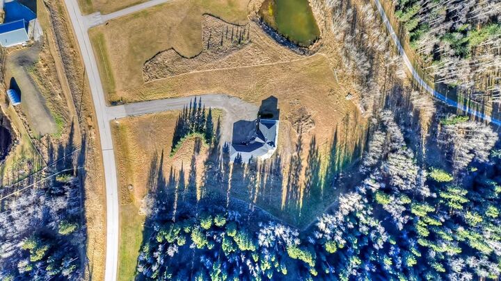 Property Photo: 298042 218 Street W AB T1S 2Y6