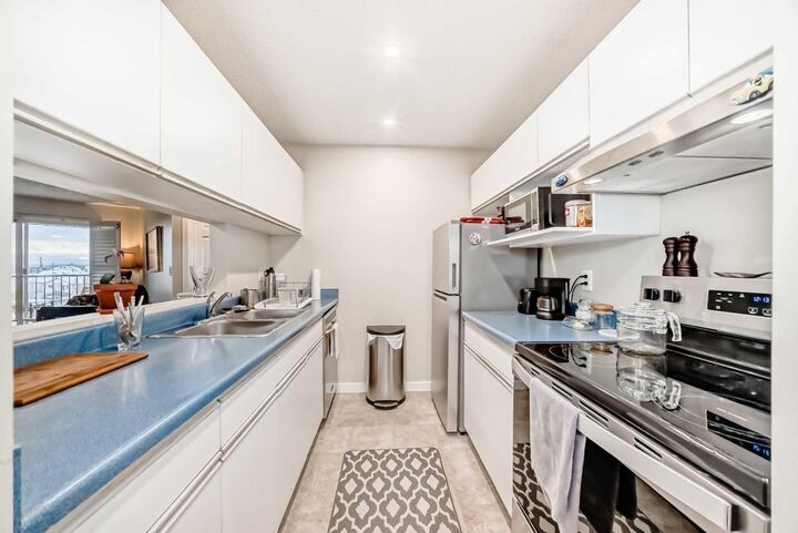 Property Photo:  10 Dover Point SE 409  AB T2B 3K2 