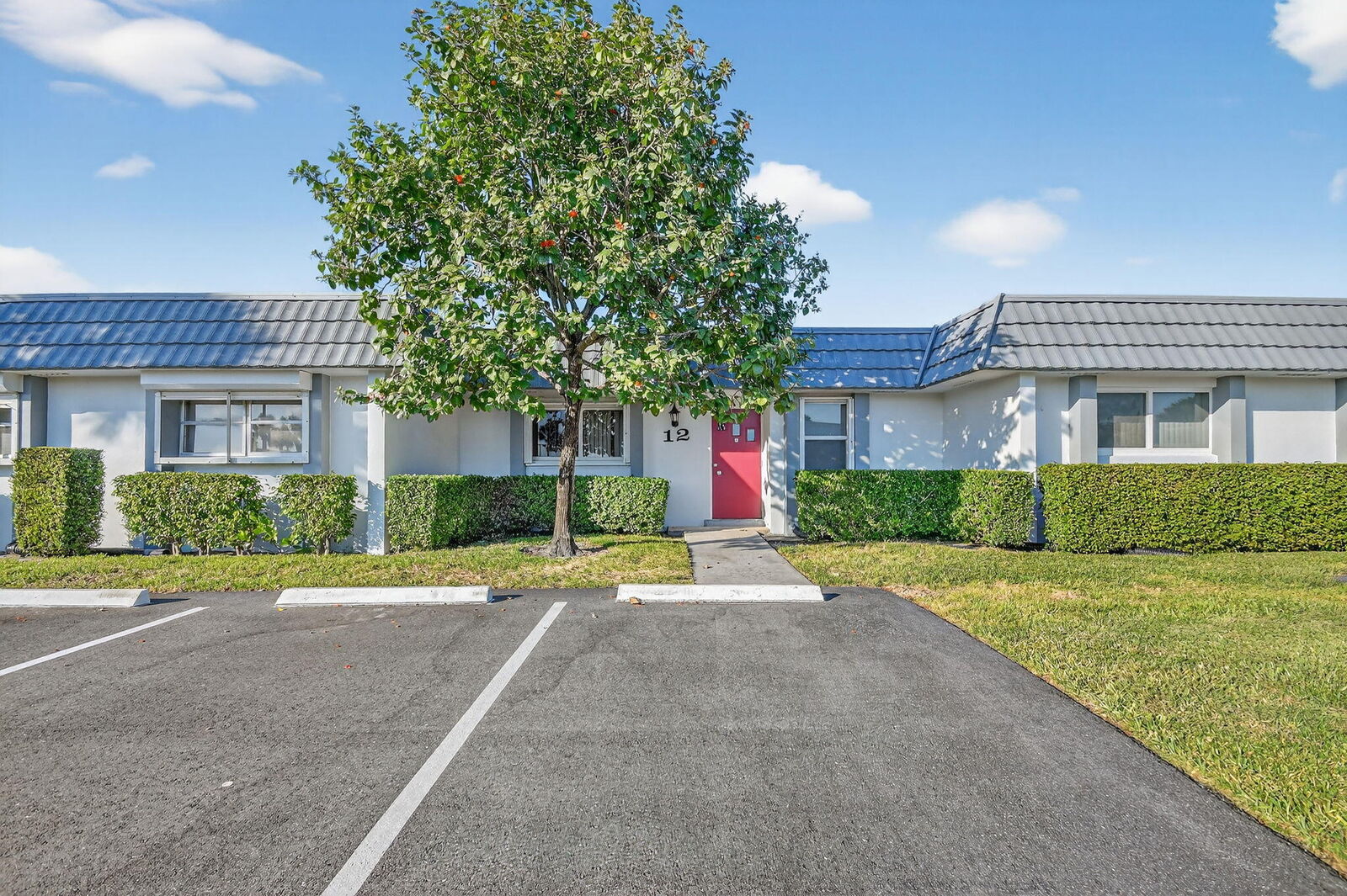 Property Photo: 2886 Fernley Drive E 12 FL 33415