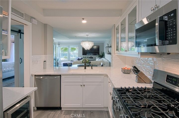 Property Photo:  220 Nice Lane 215  CA 92663 