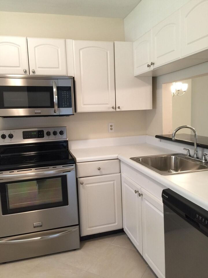 Property Photo:  6772 Palmetto Circle S 104  FL 33433 