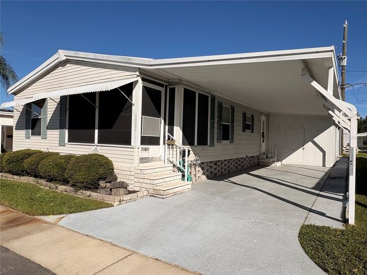 Property Photo:  34089 Alamanda Drive N  FL 33781 