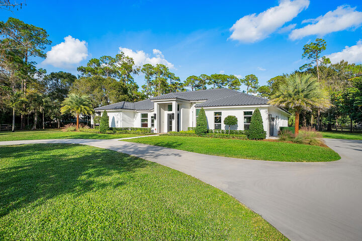 Property Photo: 704 Deerwood Court FL 33414